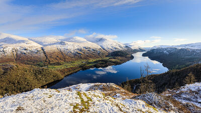 Thirlmere with snow capped mountains as seen from Raven Crag.