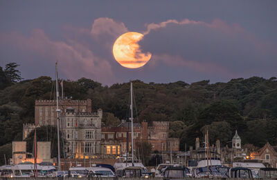Brownsea Castle with setting Harvest Moon