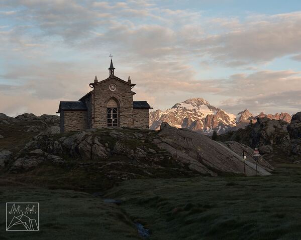 Chiesa della Madonna della Pace with Monte Disgrazia in the background lit by the first light of the day