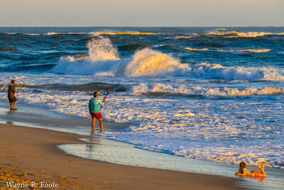 Surf fishing tournament during evening golden hour - Cape Point, Cape Hatteras National Seashore