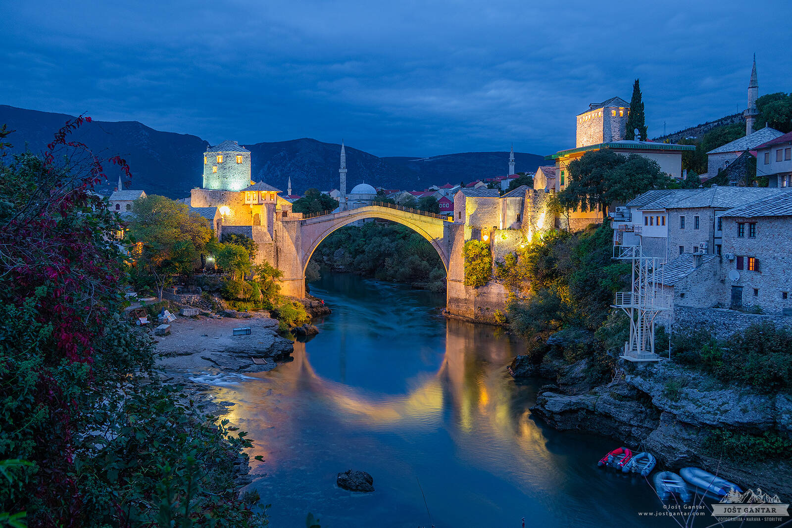 Image of Mostar Bridge from a small Parking by Jošt Gantar
