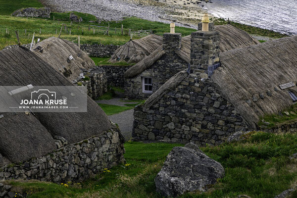 Gearrannan Blackhouse Village is a restored blackhouse village on the Isle of Lewis, Scotland, offering a glimpse into the traditional Hebridean way of life.