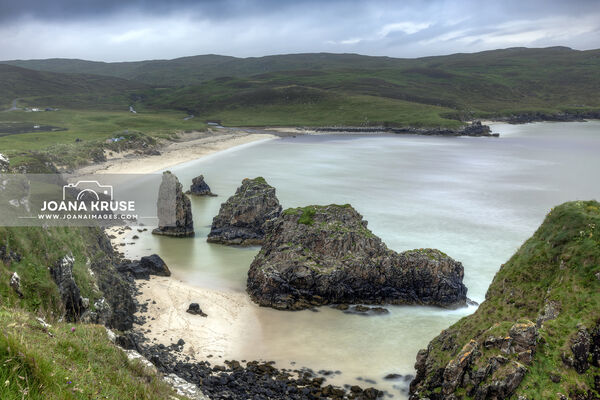 Garry Beach is a beautiful white sand beach with spectacular sea stacks and caves on the Isle of Lewis in the Outer Hebrides of Scotland.