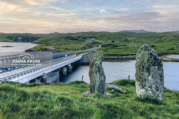 Bridge over the Atlantic to Great Bernera with standing stones, Isle of Lewis, Scotland.