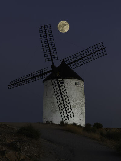 One of seven windmills located on top of hillside outside Consuegra, Spain