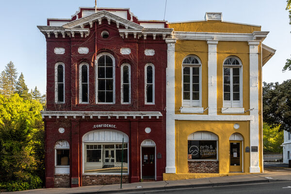 These are the Catchup and Mustard buildings which were originally the police department and the fire department,  Now, owned by the city and are under repair,
