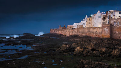 View of the Essaouira Ramparts during Blue Hour. The photo spot is accessible during low tide.
