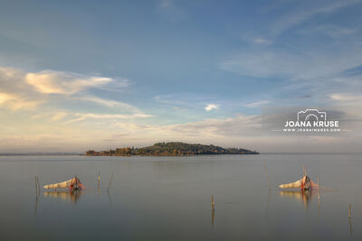 The small and authentic Umbrian fishing village San Feliciano at the Lake Trasimeno.