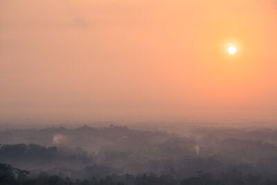 Sunrise with Borobudur temple in the morning mist