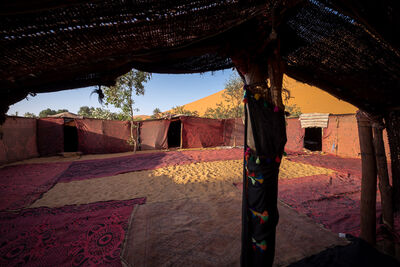 Berber tent and sand dunes